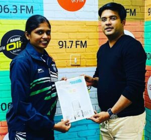Handing Over Radio Olive and Radio Suno Annual Newsletter to Ms Tintu Lukka, The Indian Olympian Star who represented India in the 2012 and 2016 World Olympics