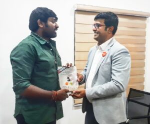 Handing over Radio Suno's token of love to the well known actor vijaysethupathi