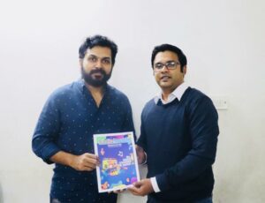 Handing over our Newsletter to South Indian Actor Karthi