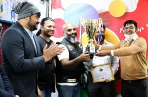 Handing over the momento to Tribe Qatar Captain Mr. Shammy as part of the Qatar National Day Event "Lets ride Qatar", An initiative of Olive suno radio network.