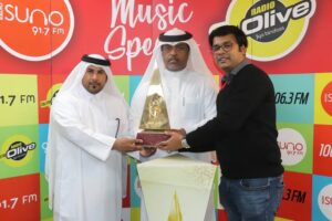 Receiving Qatar cup trophy to host during the trophy tour at olive suno radio network office from Qatar cup representative Mr. Nasar al khuwari with the presence of shaikh faleh bin ghanem althani