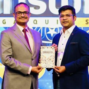 Receiving the copy of DecodingCommunication book from the author Mr.Manzoor moideenDistrict Director at Toastmasters International and General Manager at Genius International WLL